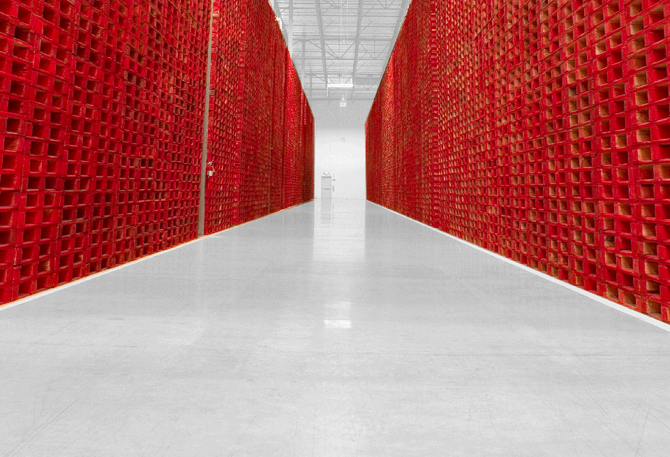 Pallets Lining a Corridor